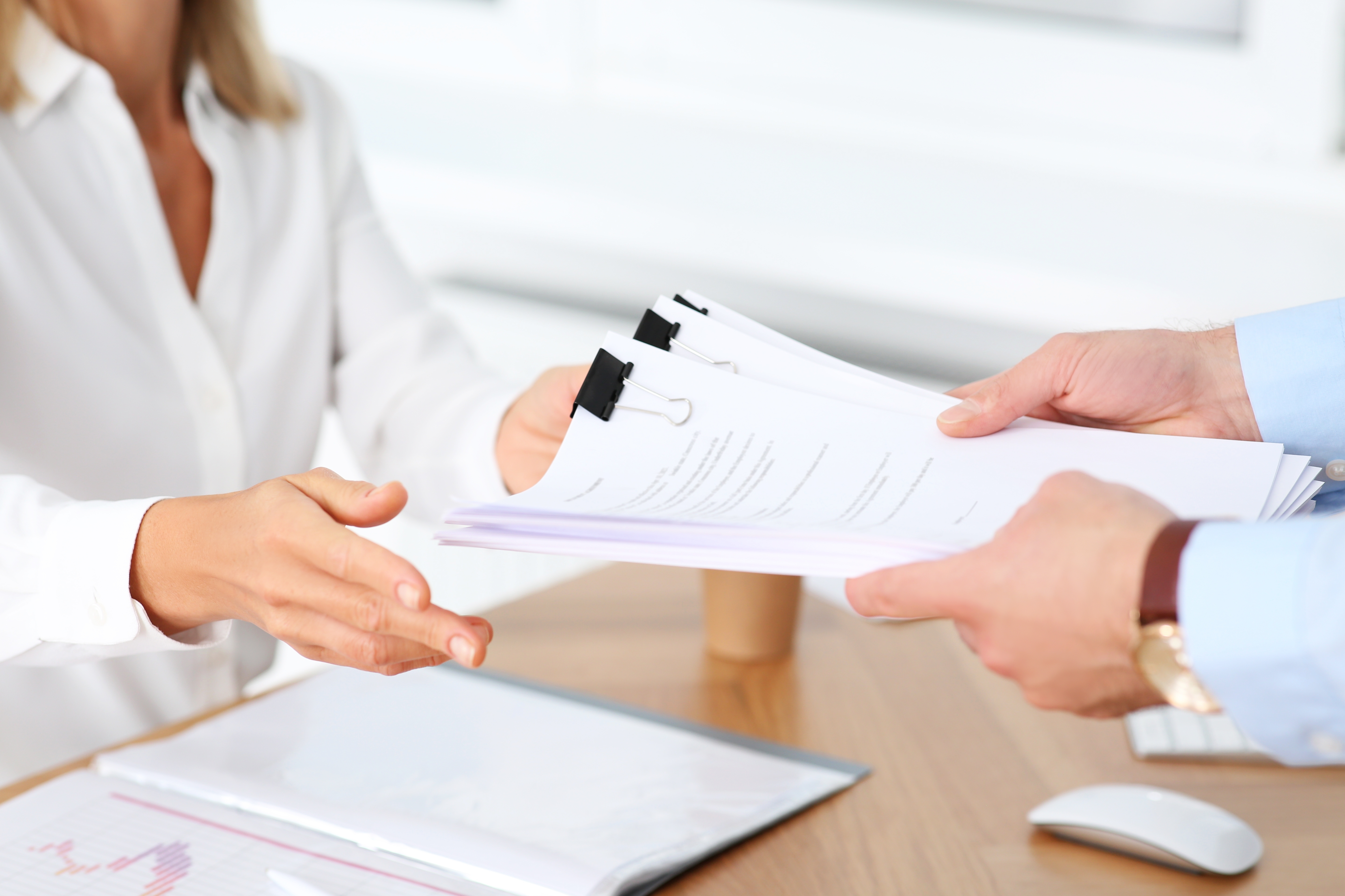 Handing Over Paperwork